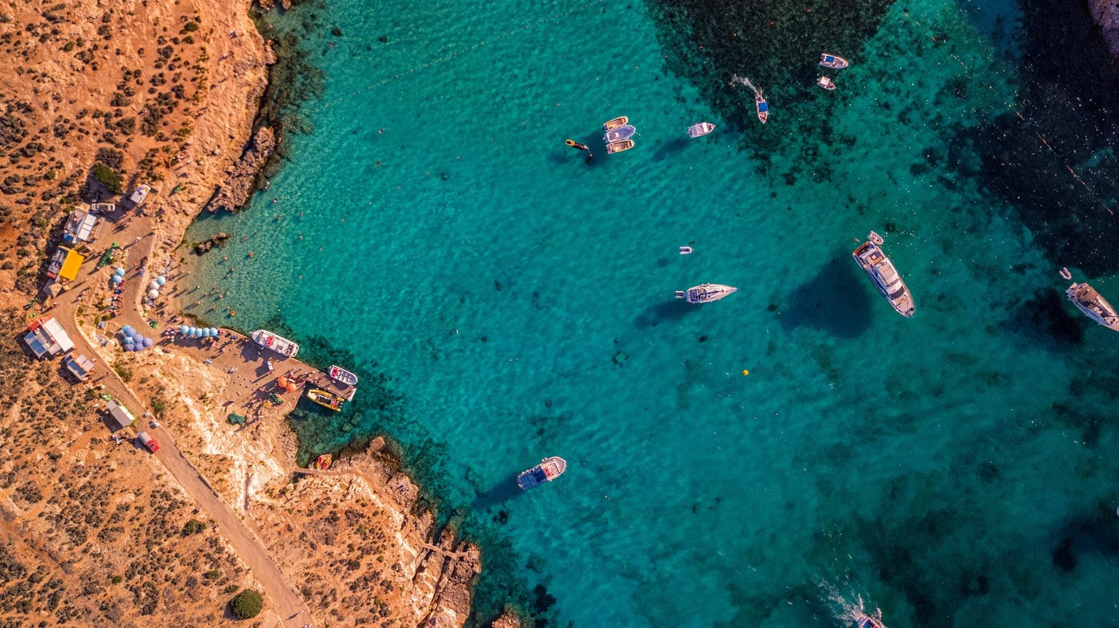 aerial view of blue sea water near island